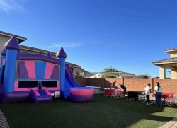 a24d81b0b9e1b25f5925a063e4625bef 1768184831 Pink-Blue Bounce House With Slide